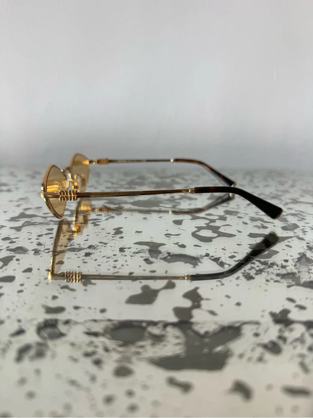 Miu Miu Sunglasses with Yellow Lenses